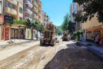 تخریب آسفالت فرسوده و زیرسازی خیابان اشکان